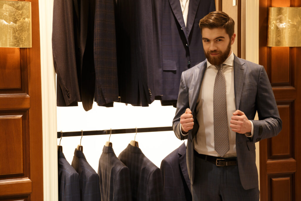 man in suit posing shop
